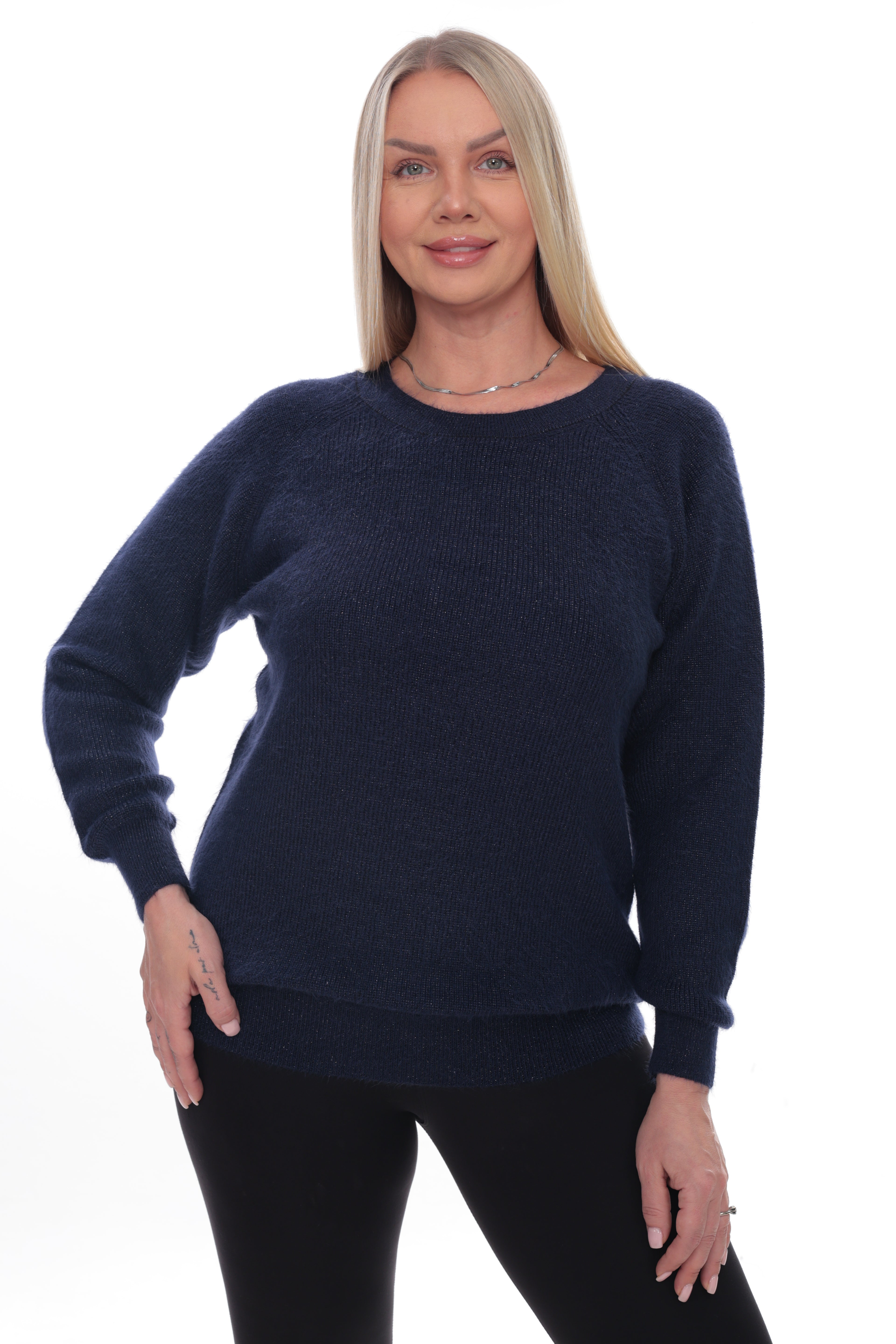 A woman modeling a dark navy blue knit crewneck sweater against a plain white background.